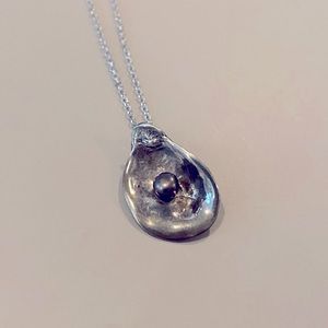 Sterling Silver Oyster Necklace with Black Pearl